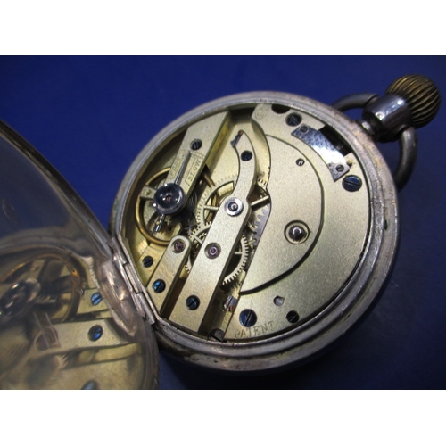 69 - A continental 875 silver cased open face pocket watch, runs well when wound and with general use-rel... 