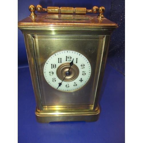 130 - A 19th century French carriage clock striking on a gong, movement by Richard & Co, in working order ... 