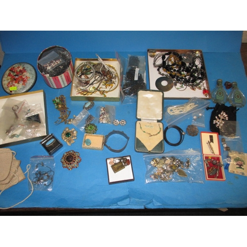 111 - A large quantity of vintage costume jewellery, to include some silver items, all in used condition