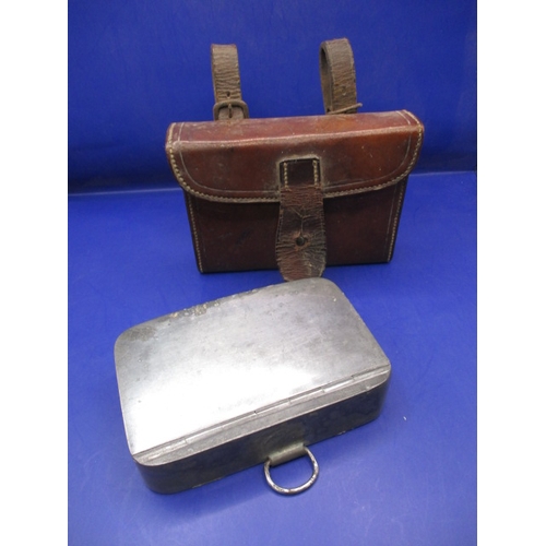 131 - An early 20th century James Dixon & Son sandwich box in original leather belt mounted case, probably... 