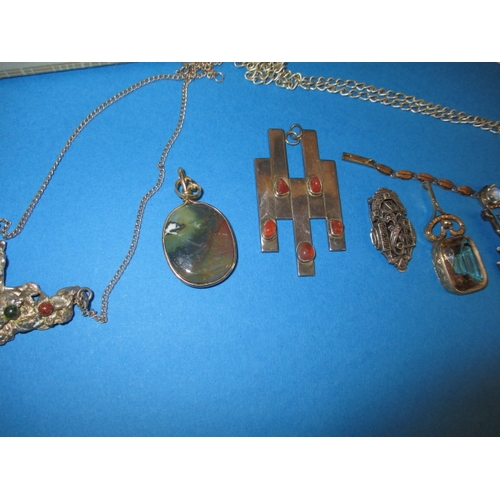 113 - A parcel of vintage costume jewellery, to include a ruby bead necklace, a 9ct gold pendant and silve... 