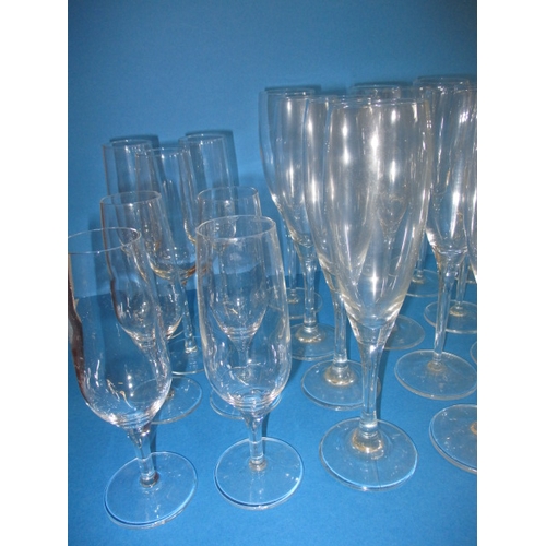 237 - A large quantity of champagne flutes, all with no observed damage, various sizes