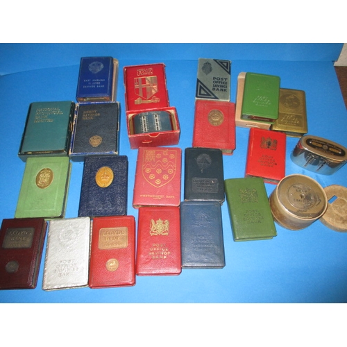 174 - A parcel of vintage post office and bank saving boxes, some with outer card packaging, all in used c... 