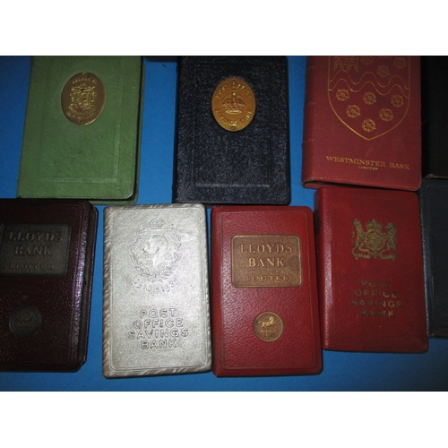 174 - A parcel of vintage post office and bank saving boxes, some with outer card packaging, all in used c... 