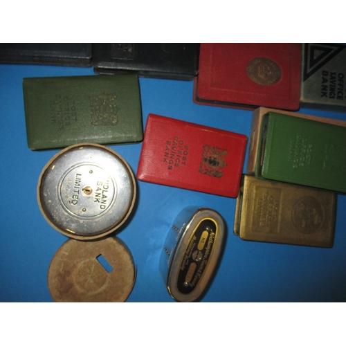 174 - A parcel of vintage post office and bank saving boxes, some with outer card packaging, all in used c... 