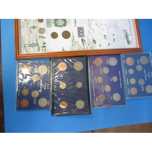 120 - A parcel of collectors coins to include a framed WWII commemorative collection