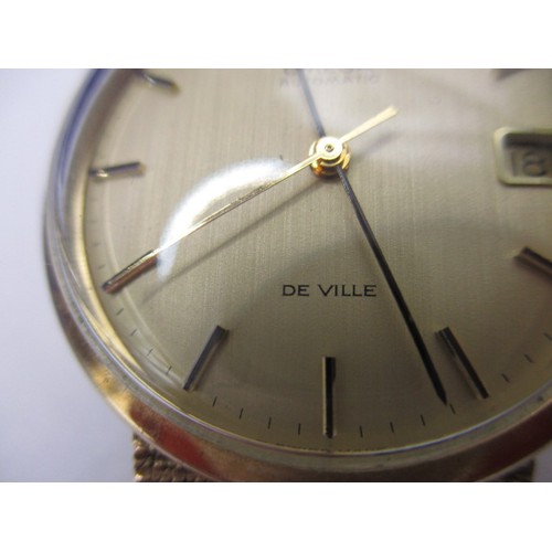 74 - A 9ct yellow gold Omega automatic De Ville watch, with full length bracelet strap and date window, i... 