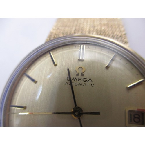 74 - A 9ct yellow gold Omega automatic De Ville watch, with full length bracelet strap and date window, i... 