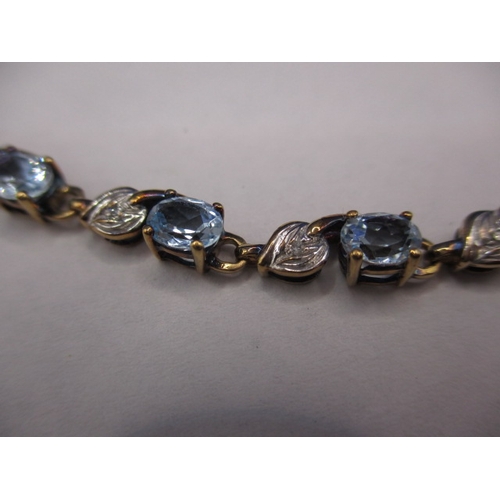 56 - A vintage 9ct rose gold diamond and aquamarine tennis bracelet, approx. linear length 19cm, approx. ... 