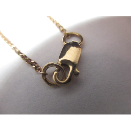 58 - A 9ct gold necklace chain with a 9ct bicolour gold pendant and an Edwardian 18ct gold pendant with a... 