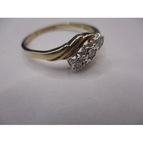24 - A 1930’s 9ct gold 3 stone diamond ring. Approximate ring size T, approx. weight 2.3g. With use relat... 