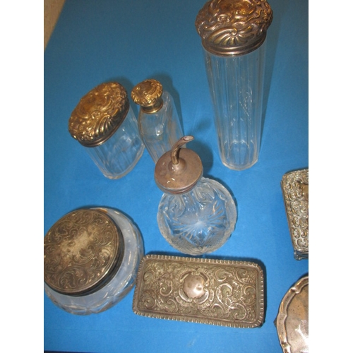 103 - A parcel of silver and silver mounted items, to include a pen wipe jars and vanity items, approx. si... 