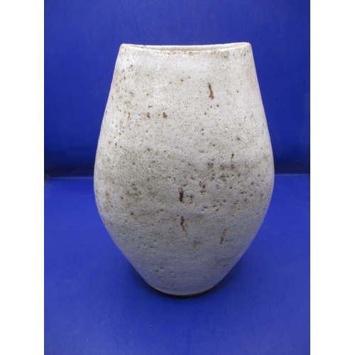 140 - A Lucie Rie off white feldspatic glaze vase, approx. height 19cm, having stamp to base and original ...