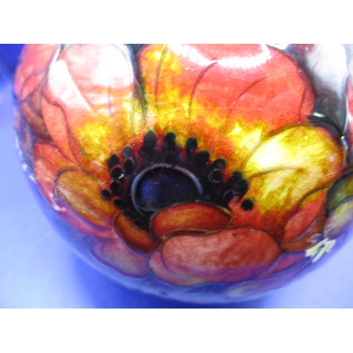 142 - William Moorcroft Flambe Poppy vase, shape 55, C.1930s approx.  height 15.5cm in good condition with... 