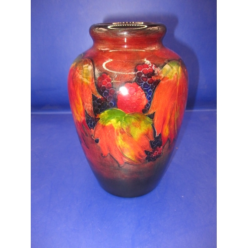 143 - William Moorcroft flambe leaf and blackberry vase C. 1930s, approx. height 16cm, in good condition w... 