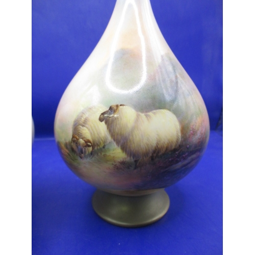 144 - A pair of Royal Worcester vases depicting sheep both signed E Barker approx. height 20cm, both with ... 