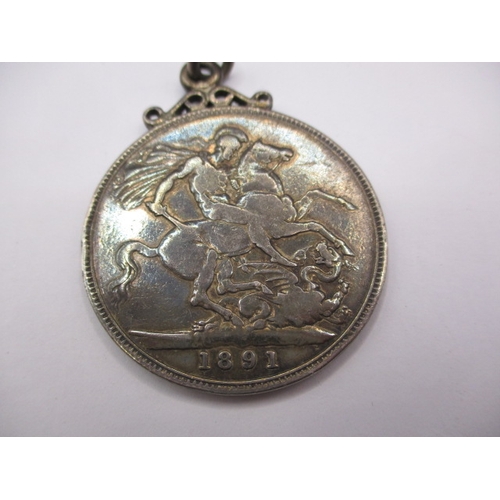 70 - An antique sterling silver pocket watch, in working order, a solver crown dated 1891 and a silver me... 