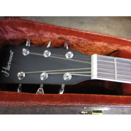 152 - A Hartwood electro acoustic guitar in hard travel case, in very good used condition