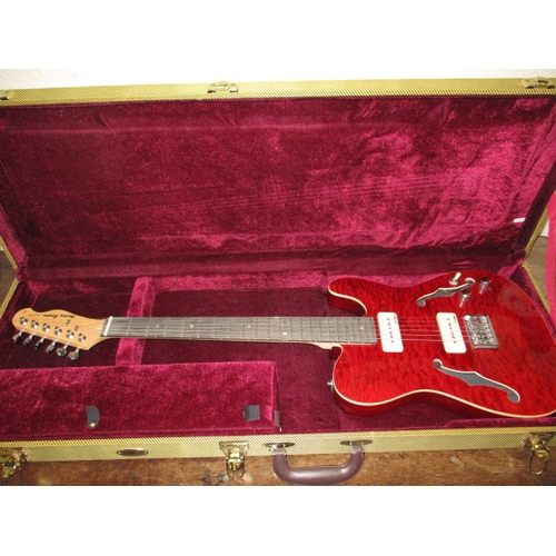 A Harley Benton Stratocaster model electric guitar, in custom hard case, in near new condition