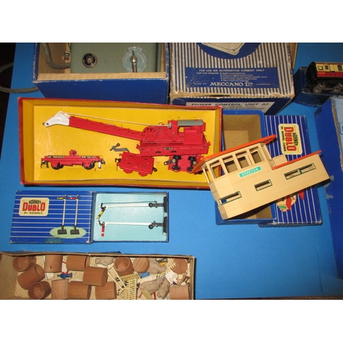 151 - A mid 20th century Hornby Meccano 00 gauge railway set, being 3 rail, with numerous additions, in go... 