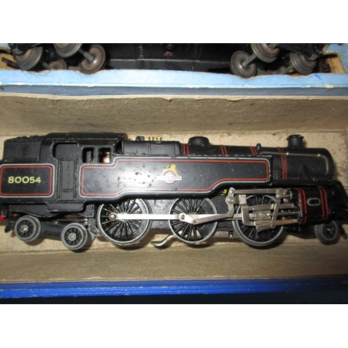 151 - A mid 20th century Hornby Meccano 00 gauge railway set, being 3 rail, with numerous additions, in go... 