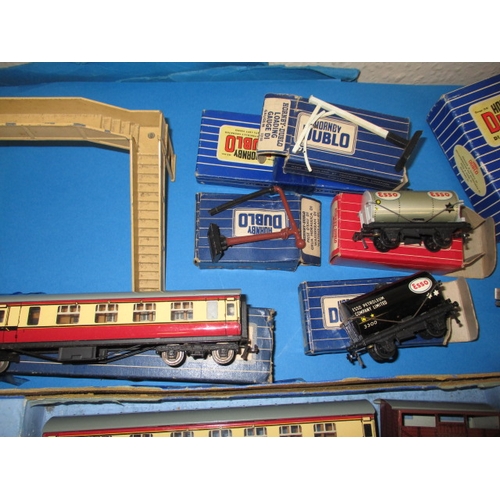 151 - A mid 20th century Hornby Meccano 00 gauge railway set, being 3 rail, with numerous additions, in go... 