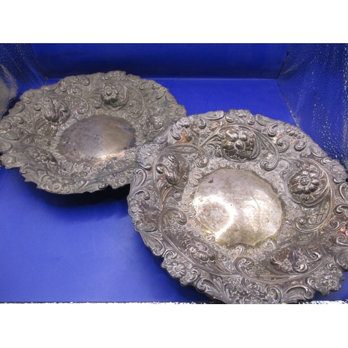 102 - Two Victorian sterling silver dishes, each with embossed floral decoration, approx. parcel weight 48... 