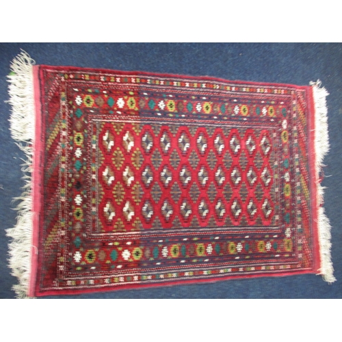 295 - An antique hand woven silk Bokhara rug, in good used condition with a little fraying to tassels, hav... 