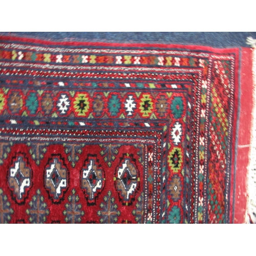 295 - An antique hand woven silk Bokhara rug, in good used condition with a little fraying to tassels, hav... 