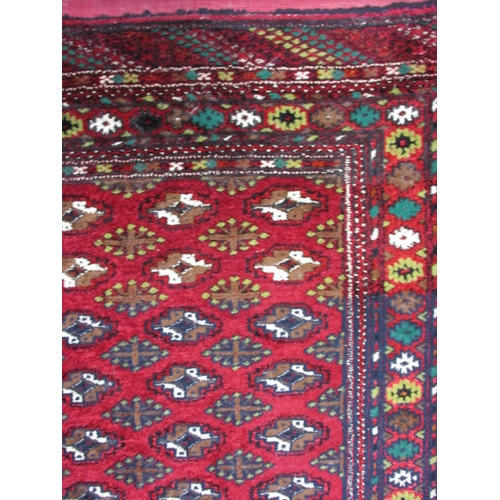 295 - An antique hand woven silk Bokhara rug, in good used condition with a little fraying to tassels, hav... 