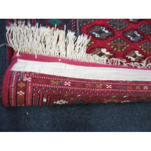 295 - An antique hand woven silk Bokhara rug, in good used condition with a little fraying to tassels, hav... 