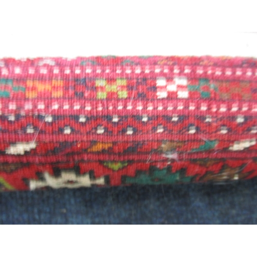 295 - An antique hand woven silk Bokhara rug, in good used condition with a little fraying to tassels, hav... 