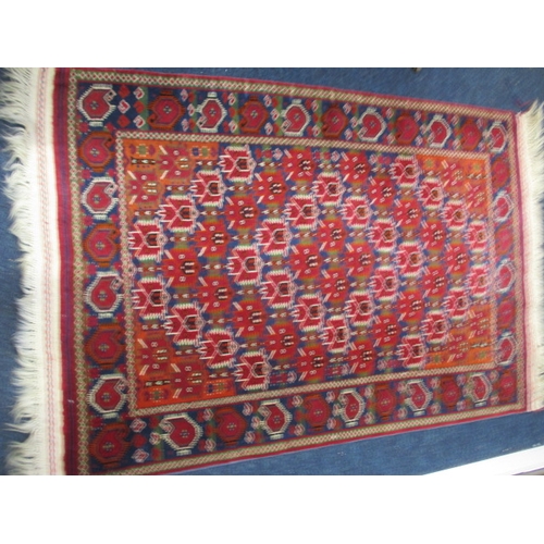 296 - A vintage hand knotted Caucasian wool rug, approx. size 150x103cm, in good pre-owned condition