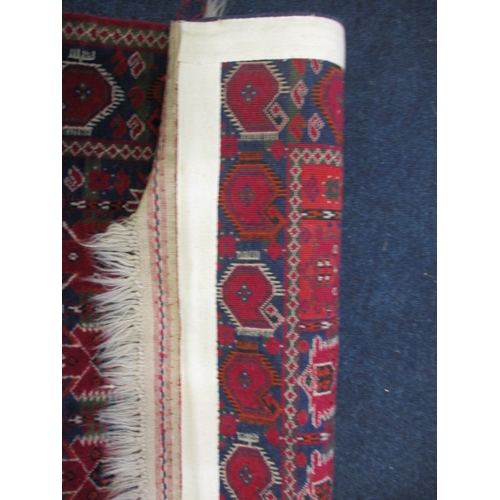 296 - A vintage hand knotted Caucasian wool rug, approx. size 150x103cm, in good pre-owned condition