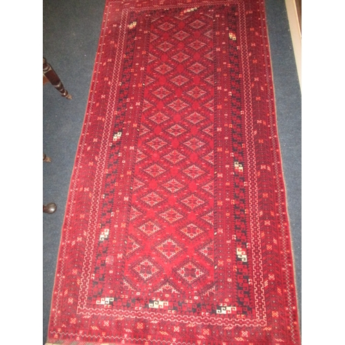 297 - A vintage Bokhara hand knotted wool rug, approx. size 204x102, in good pre-owned condition