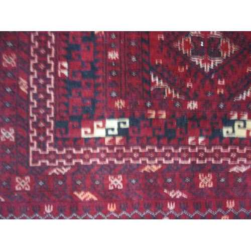 297 - A vintage Bokhara hand knotted wool rug, approx. size 204x102, in good pre-owned condition