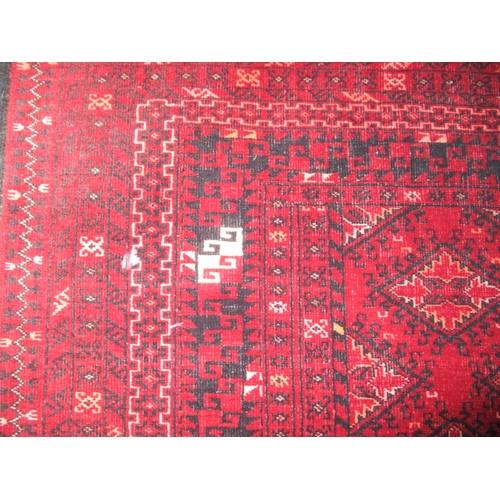 297 - A vintage Bokhara hand knotted wool rug, approx. size 204x102, in good pre-owned condition