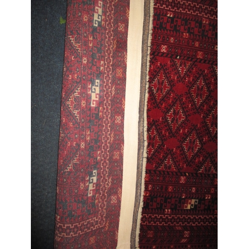 297 - A vintage Bokhara hand knotted wool rug, approx. size 204x102, in good pre-owned condition