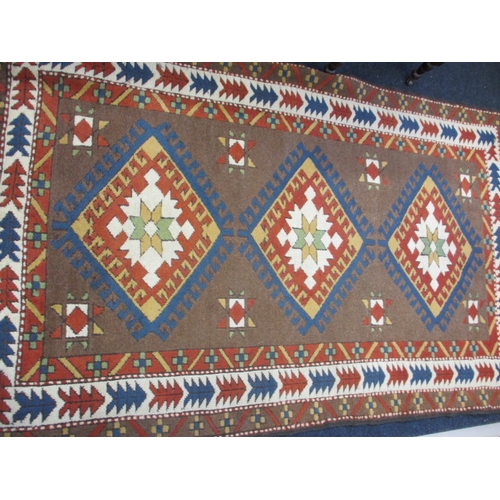 298 - A vintage Turkish hand knotted wool rug, approx. size 204x120cm in good pre-owned condition with wal... 