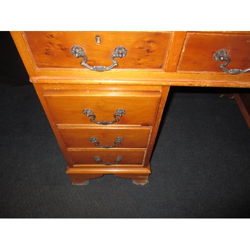 301 - A contemporary 9 drawer, 3 part pedestal desk, in well used condition with use-related marks, approx... 