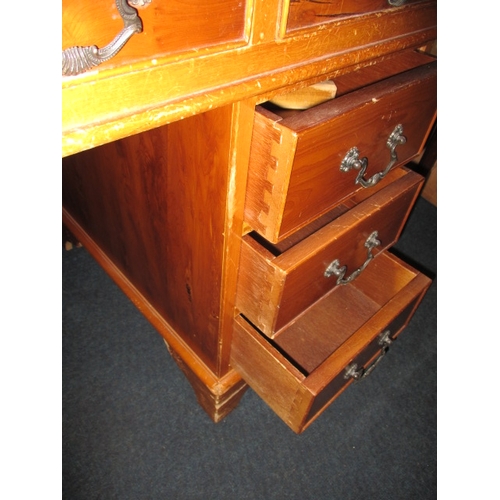 301 - A contemporary 9 drawer, 3 part pedestal desk, in well used condition with use-related marks, approx... 