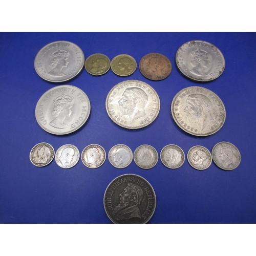 A small parcel of pre-decimal coins to include silver and part-silver examples and an 1897 South African 2 ½ shilling coin (half crown), all in circulated condition