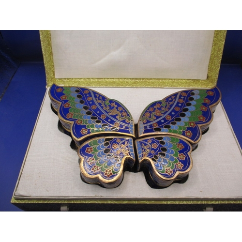 266 - A boxed set of 4 cloisonne enamel trinket boxes in the form of a butterfly, in unused condition