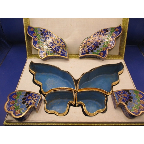 266 - A boxed set of 4 cloisonne enamel trinket boxes in the form of a butterfly, in unused condition