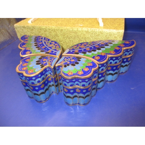 266 - A boxed set of 4 cloisonne enamel trinket boxes in the form of a butterfly, in unused condition