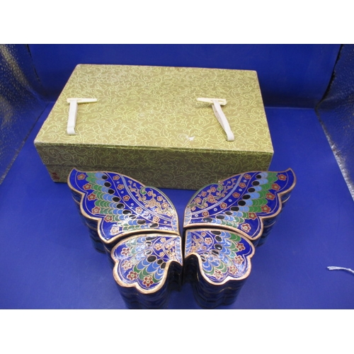 266 - A boxed set of 4 cloisonne enamel trinket boxes in the form of a butterfly, in unused condition