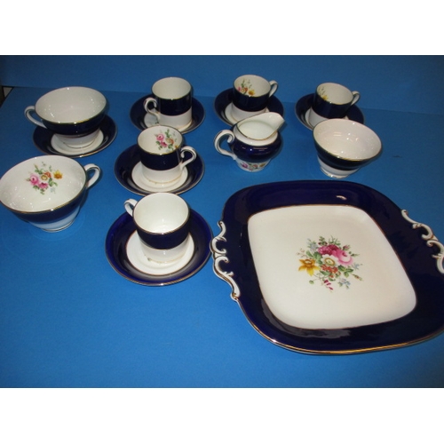 273 - A vintage Coalport part coffee/tea set, decorated with floral sprays with a rich blue ground, all wi... 