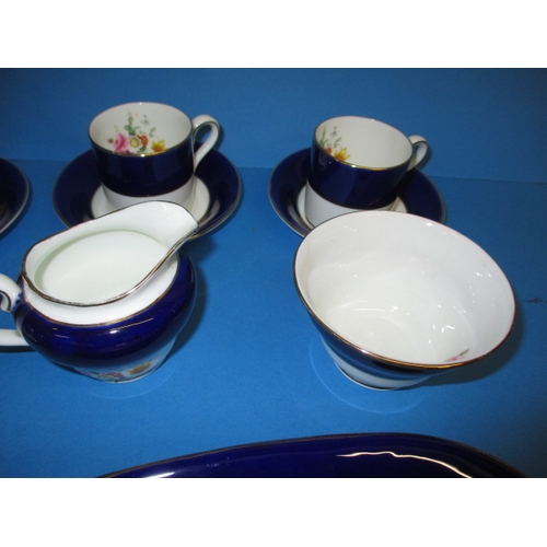 273 - A vintage Coalport part coffee/tea set, decorated with floral sprays with a rich blue ground, all wi... 