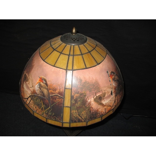 284 - A contemporary table lamp, with robin decoration. Having use related marks