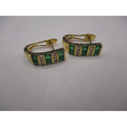 59 - A pair of 750 yellow gold, diamond and emerald earrings, approx. weight 3g in good pre-owned conditi... 